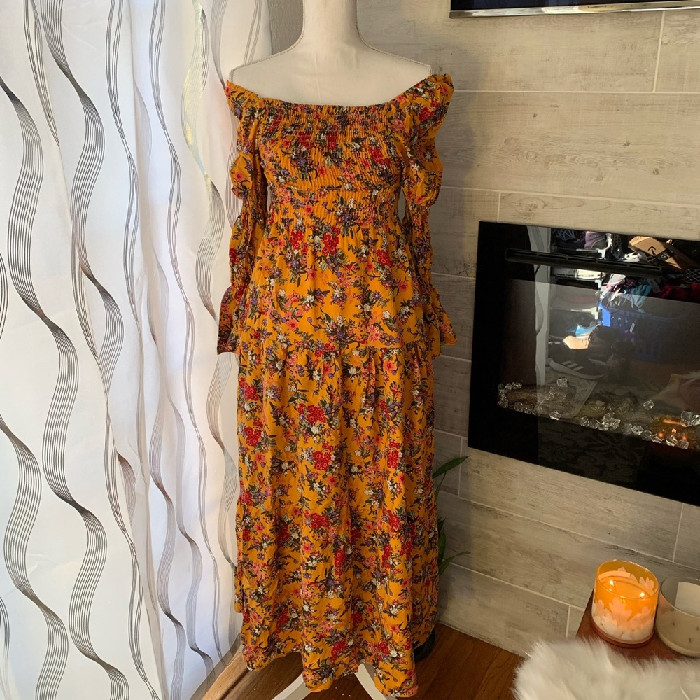 Brand New Maxi Dress. No brand. Would fit from small to large.